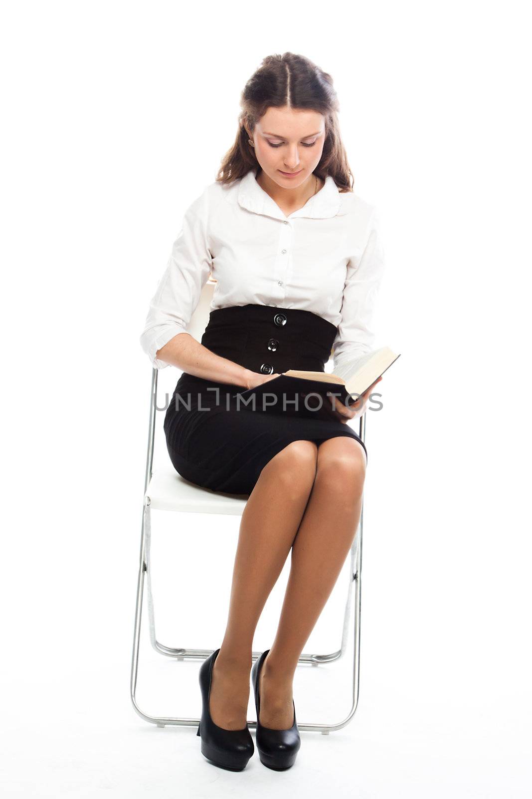 Portrait of a young and beautiful girl student who is preparing for exams
