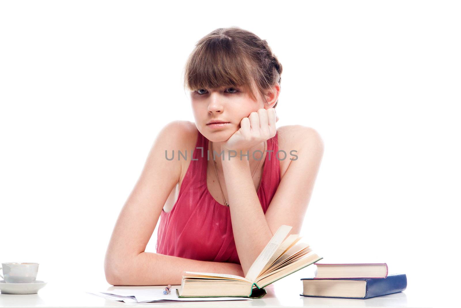 Portrait of a young and beautiful girl student who is preparing for exams