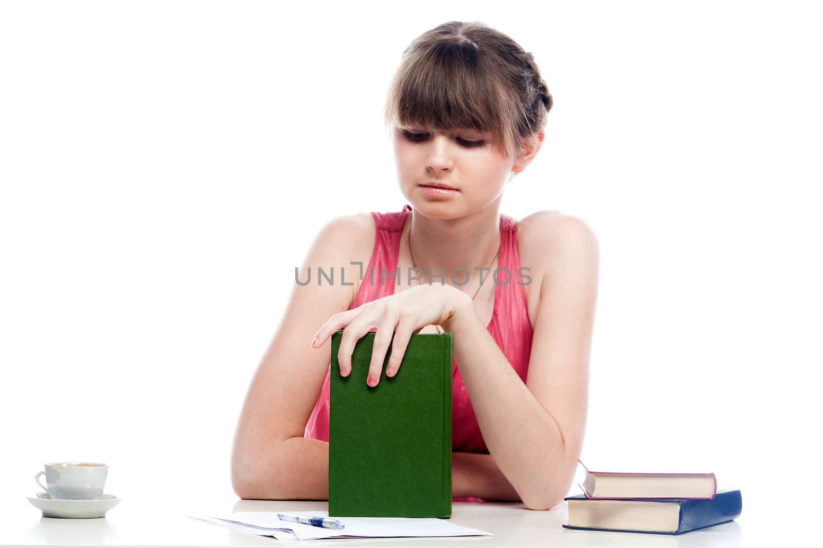 Portrait of a young and beautiful girl student who is preparing for exams