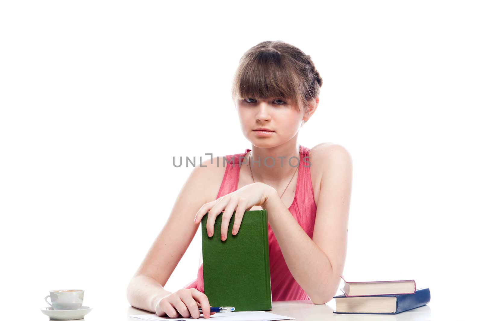 Portrait of a young and beautiful girl student who is preparing for exams