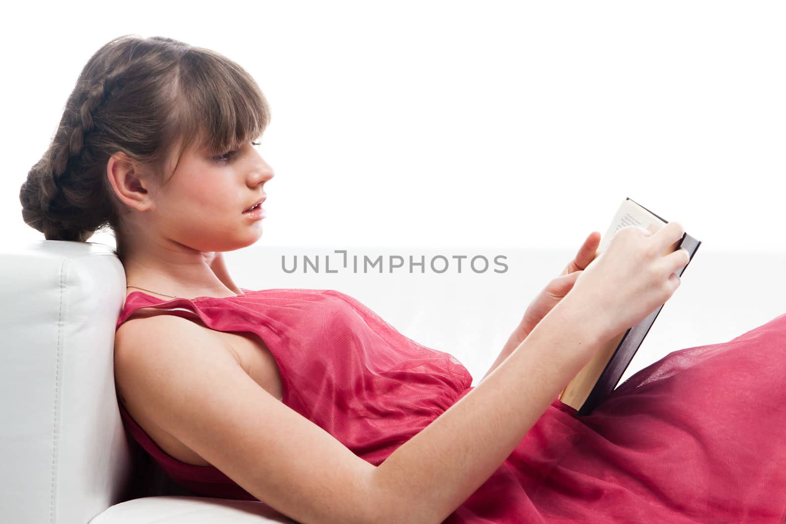 Portrait of a young and beautiful girl student who is preparing for exams
