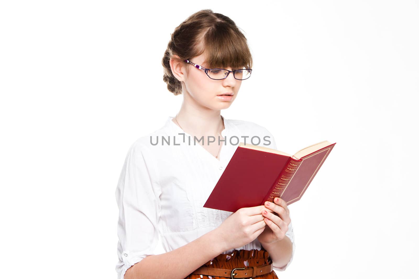 Portrait of a young and beautiful girl student who is preparing for exams