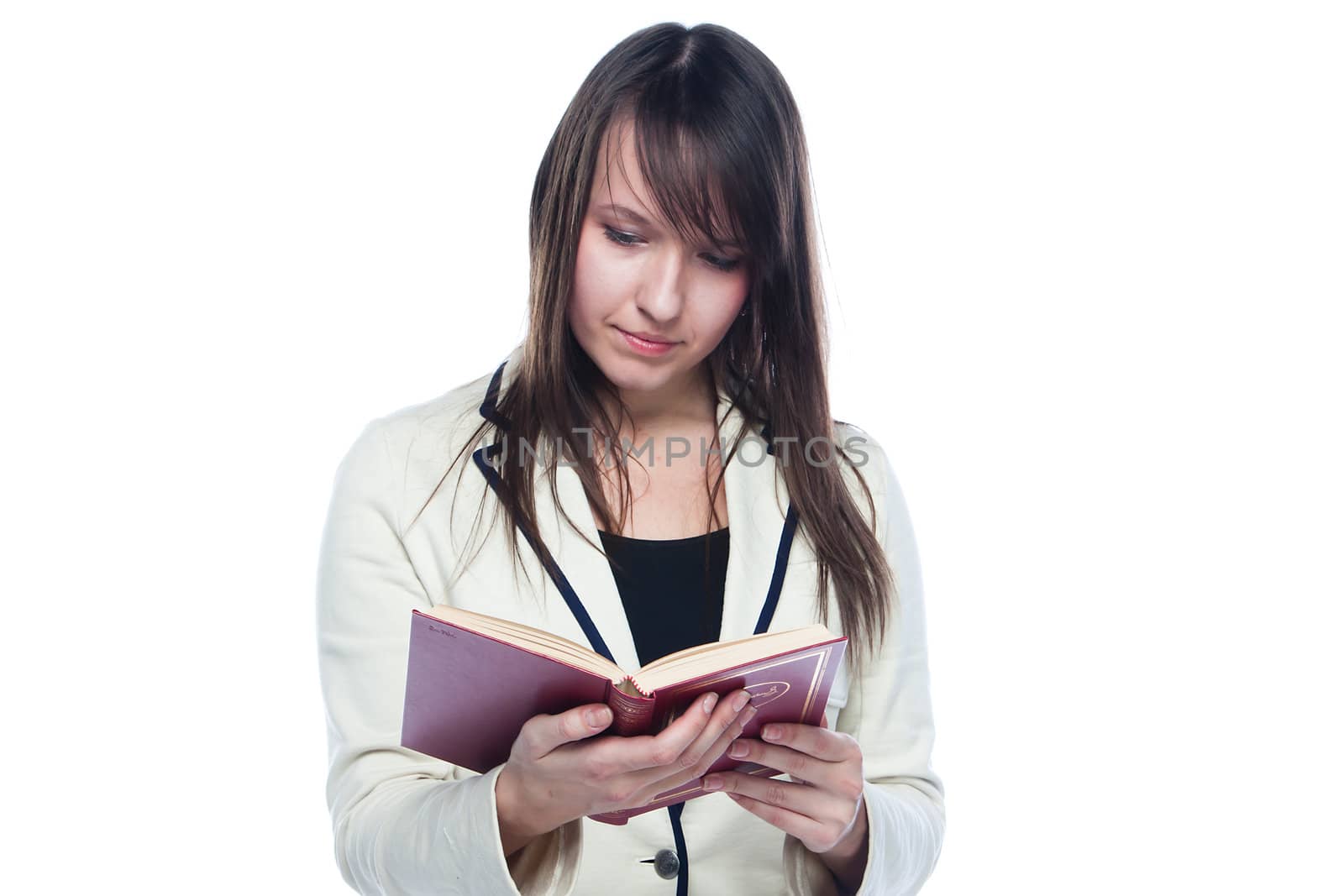 Portrait of a young and beautiful girl student who is preparing for exams