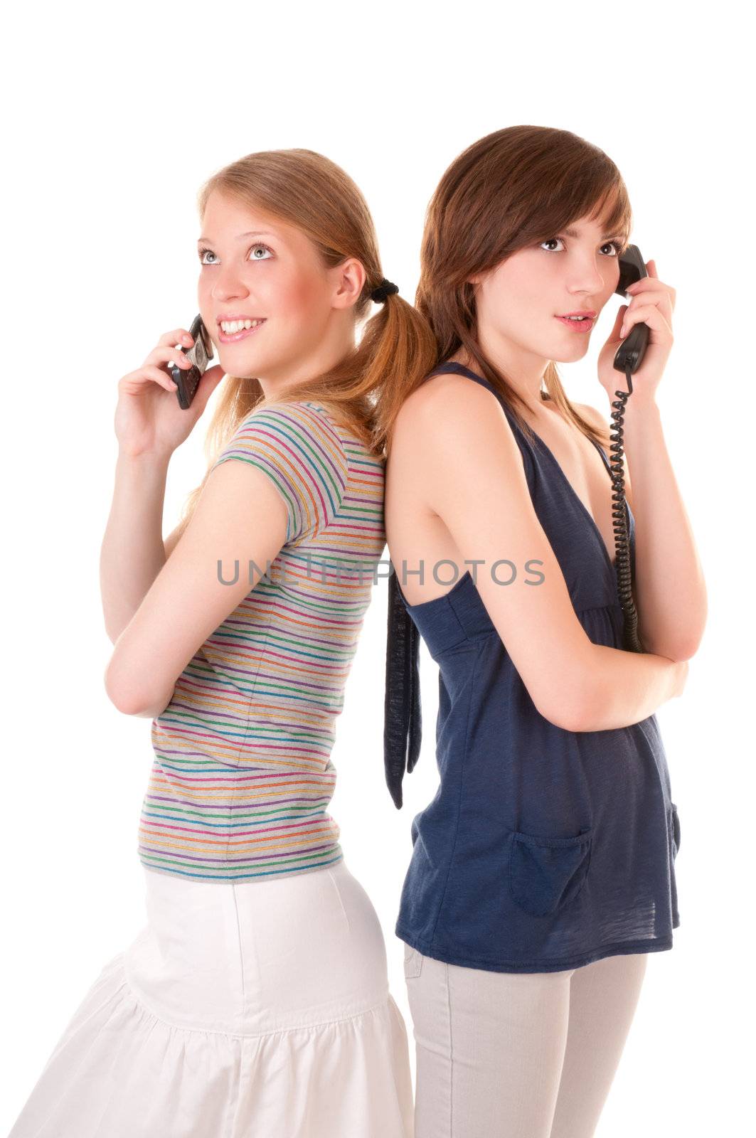 Two friends communicate by phones by iryna_rasko