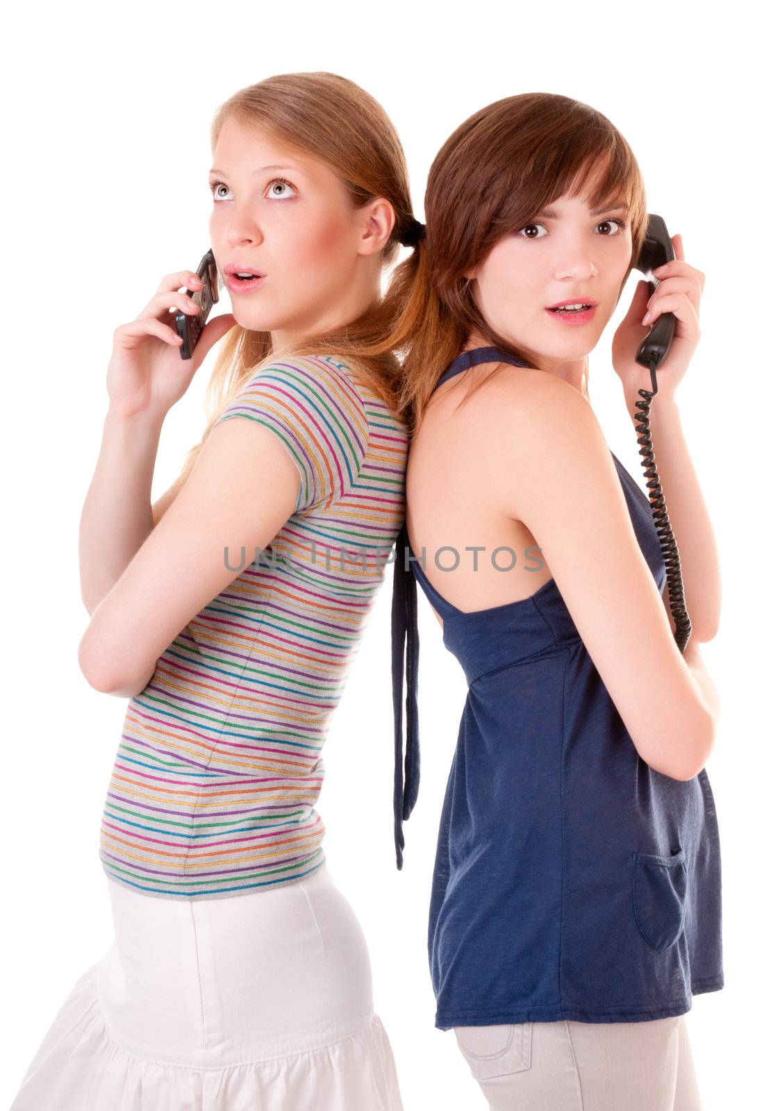 Two friends communicate by phones isolated on white background