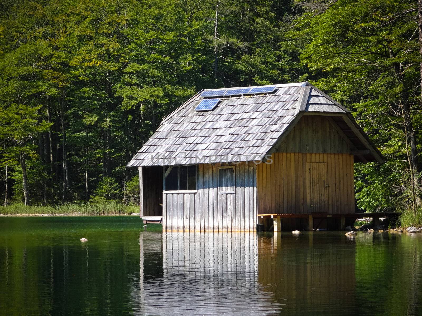 Fishing lodge with Solar array by Mbatelier