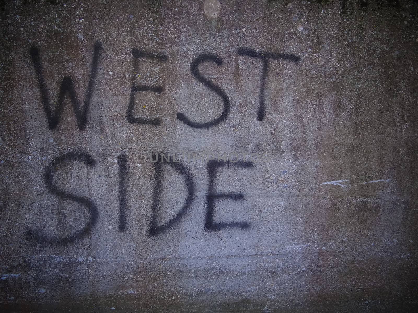 Graffiti Westside written on a cement wall