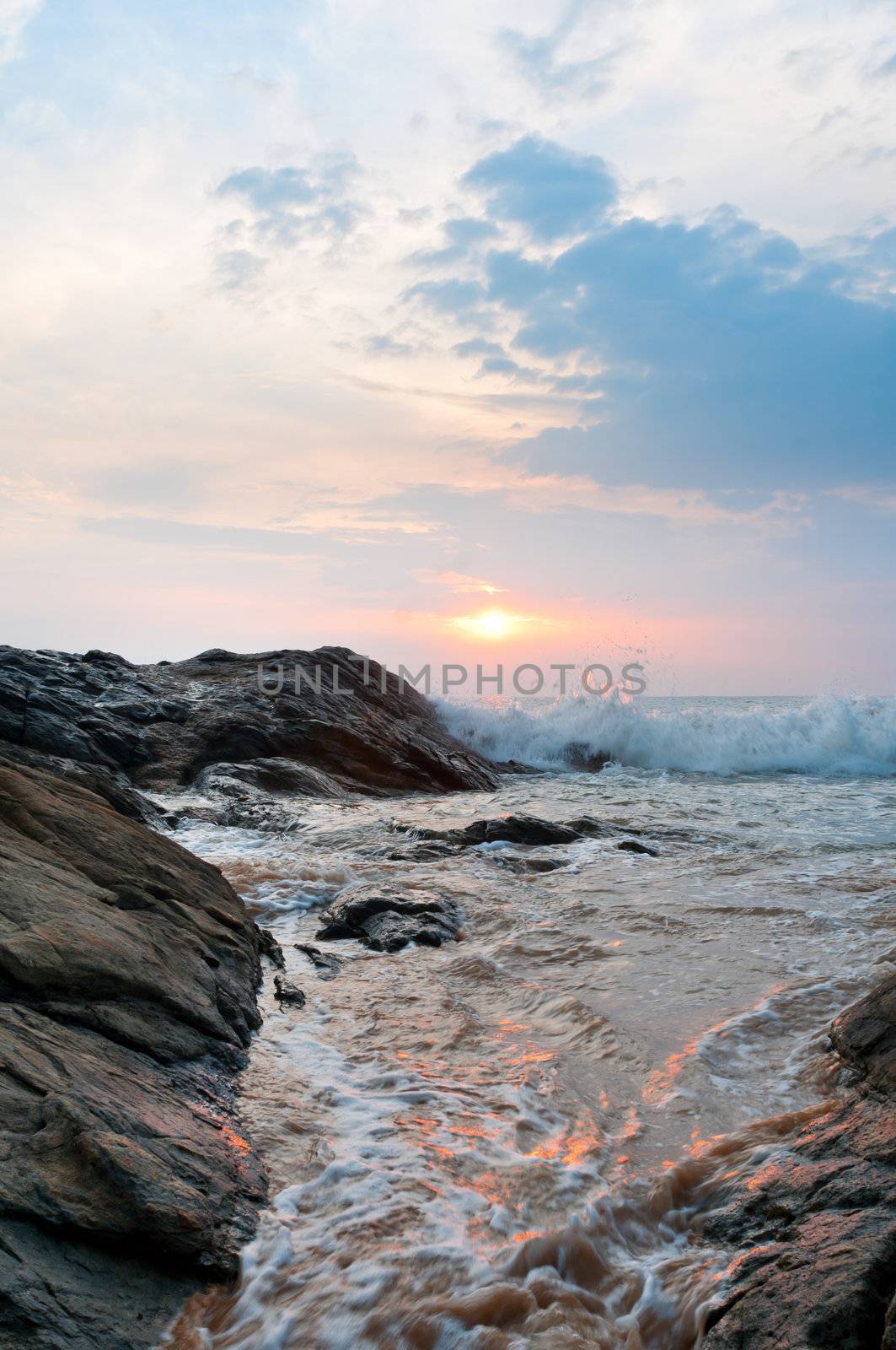Beautiful stones and waves at sunset by iryna_rasko