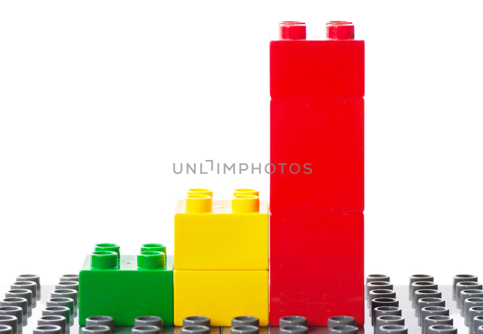 Colorful building blocks in a stair that represents growth and achievement