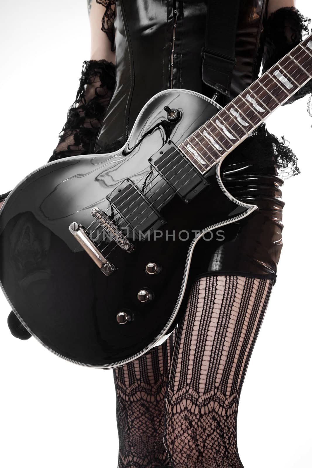 Close-up of girl with guitar, isolated on white background 