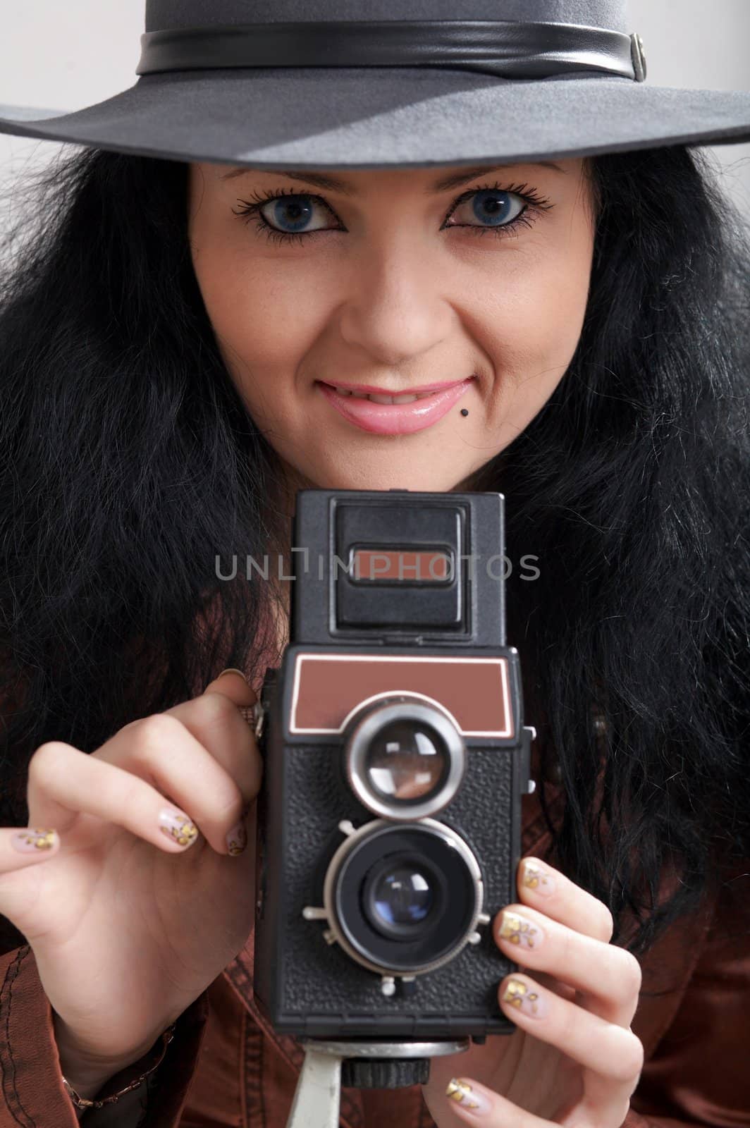 An image of a nice girl with camera