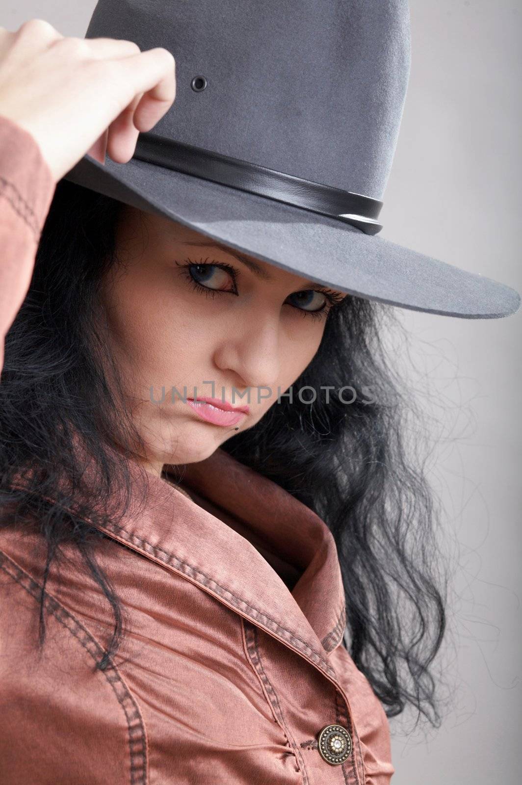 An image of a nice woman in felt hat