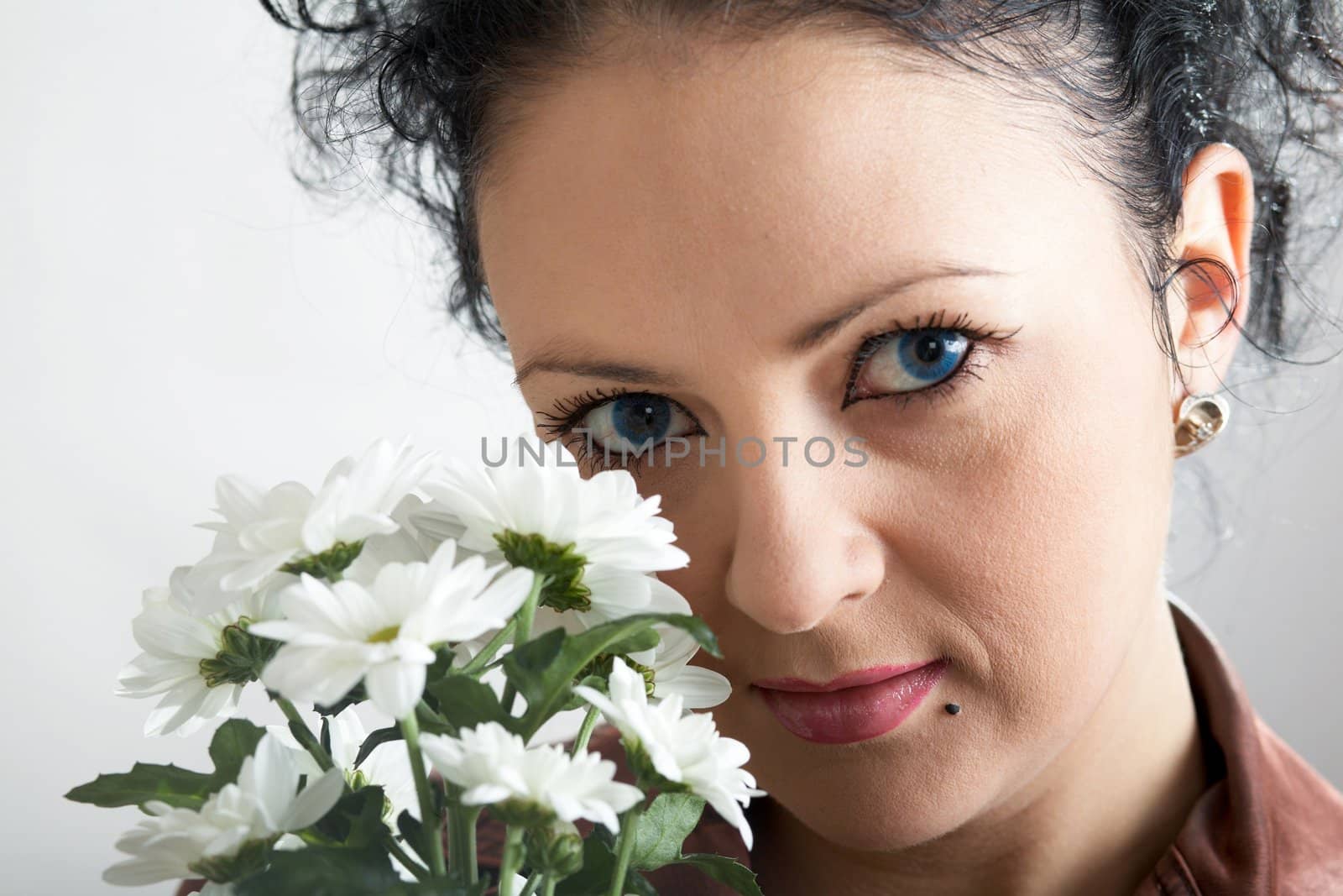 An image of nice woman with white flowers