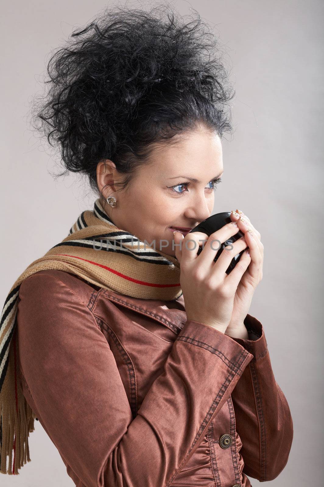 An image of beautiful girl drinking coffee