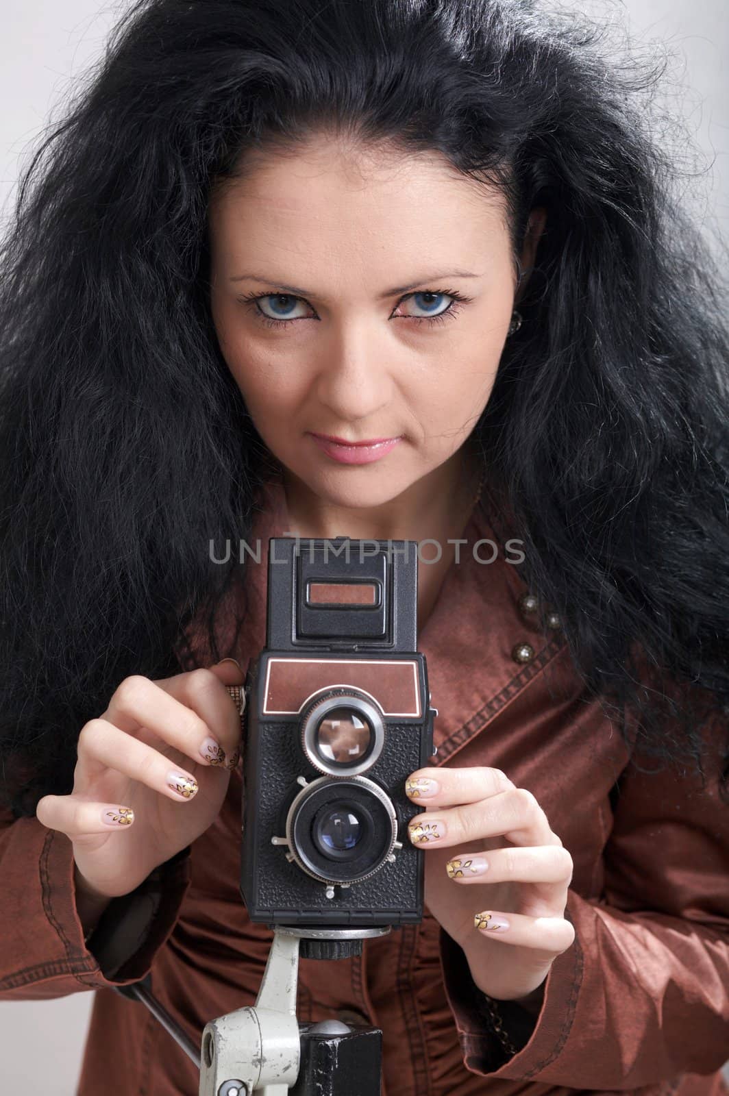 An image of a woman with camera