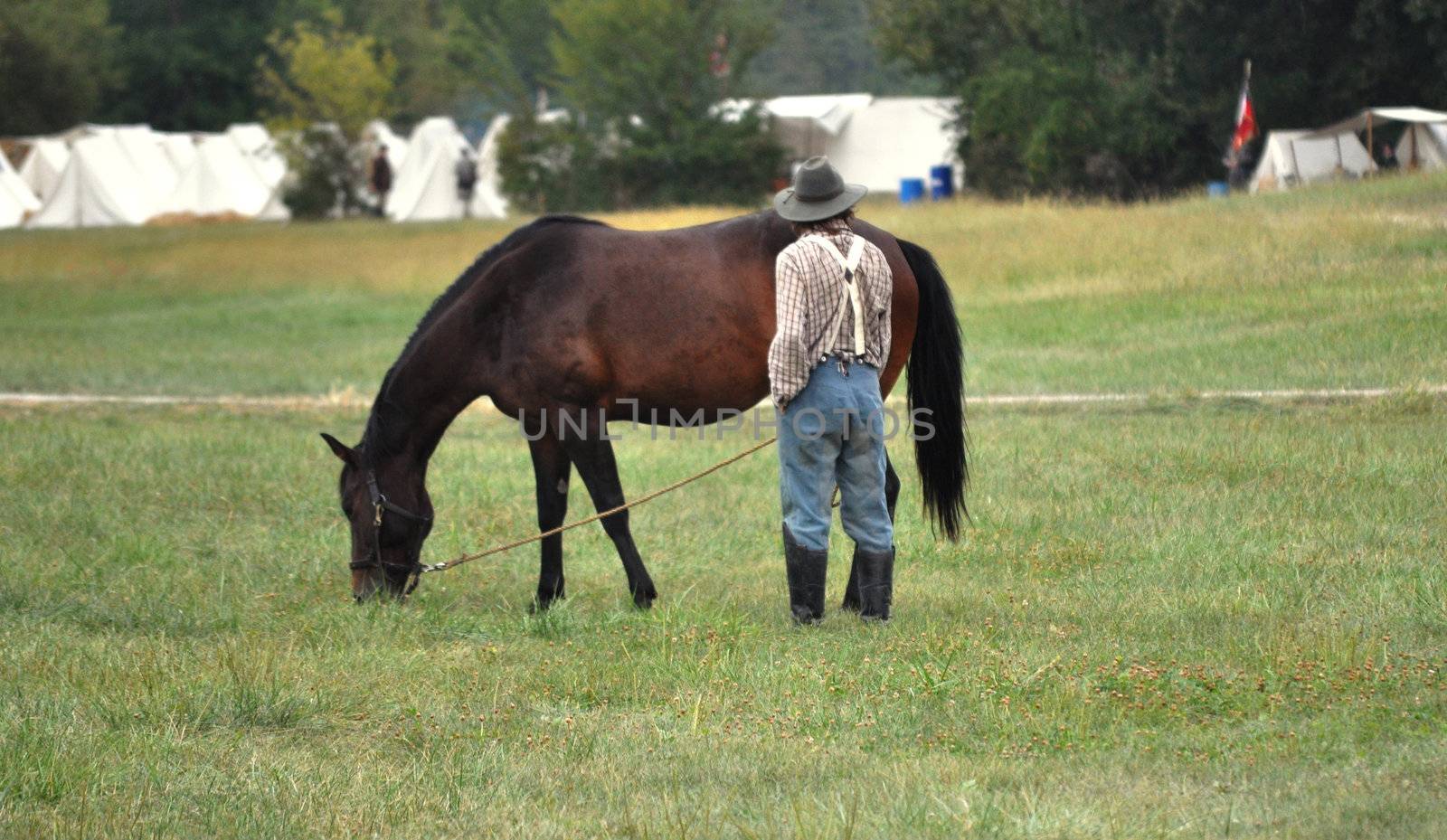 Civil War Re-enactment - man and horse by RefocusPhoto