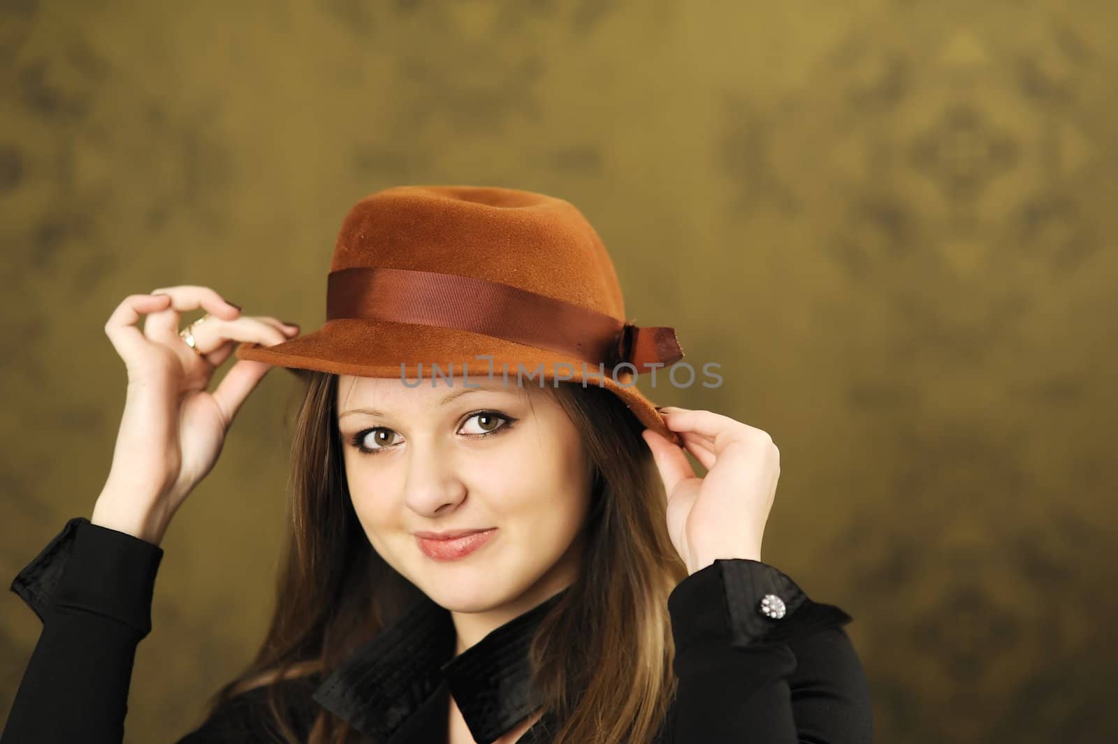 A portrait of young nice girl in studio