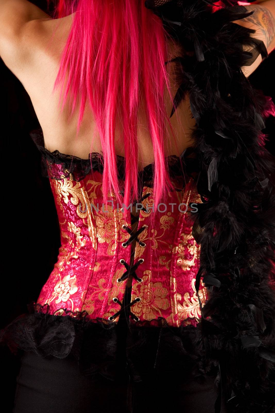 Rear view of cabaret girl in pink corset  by Elisanth