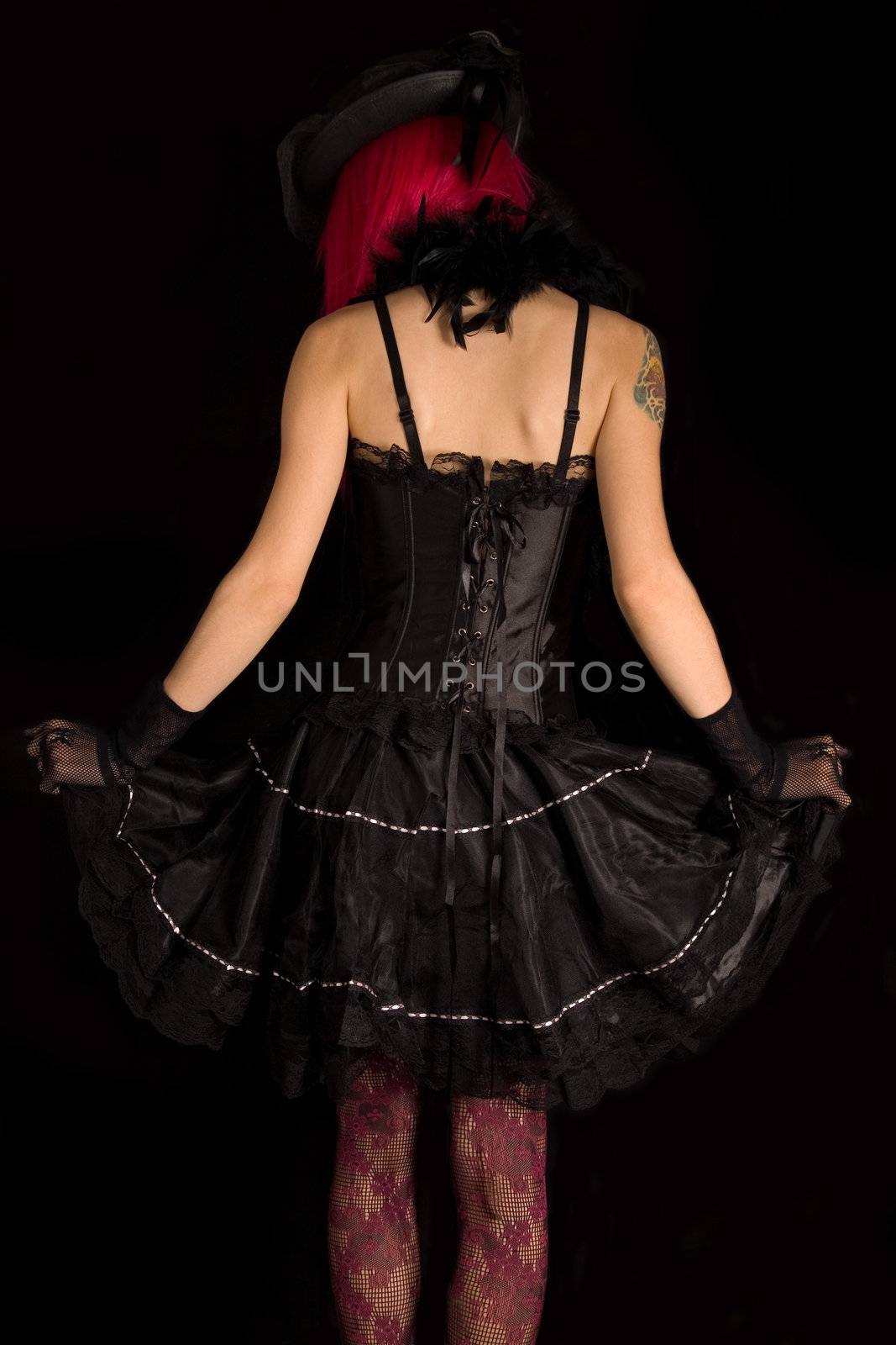 Rear view of cabaret girl in black corset dress  by Elisanth