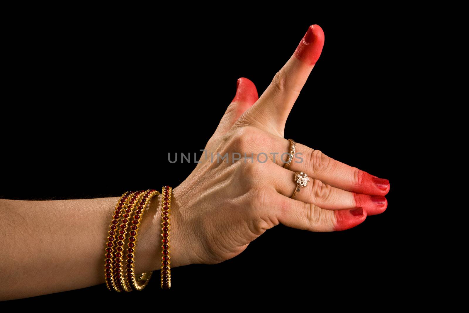 Woman hand showing Pralambha hasta of indian classic dance Bharata Natyam