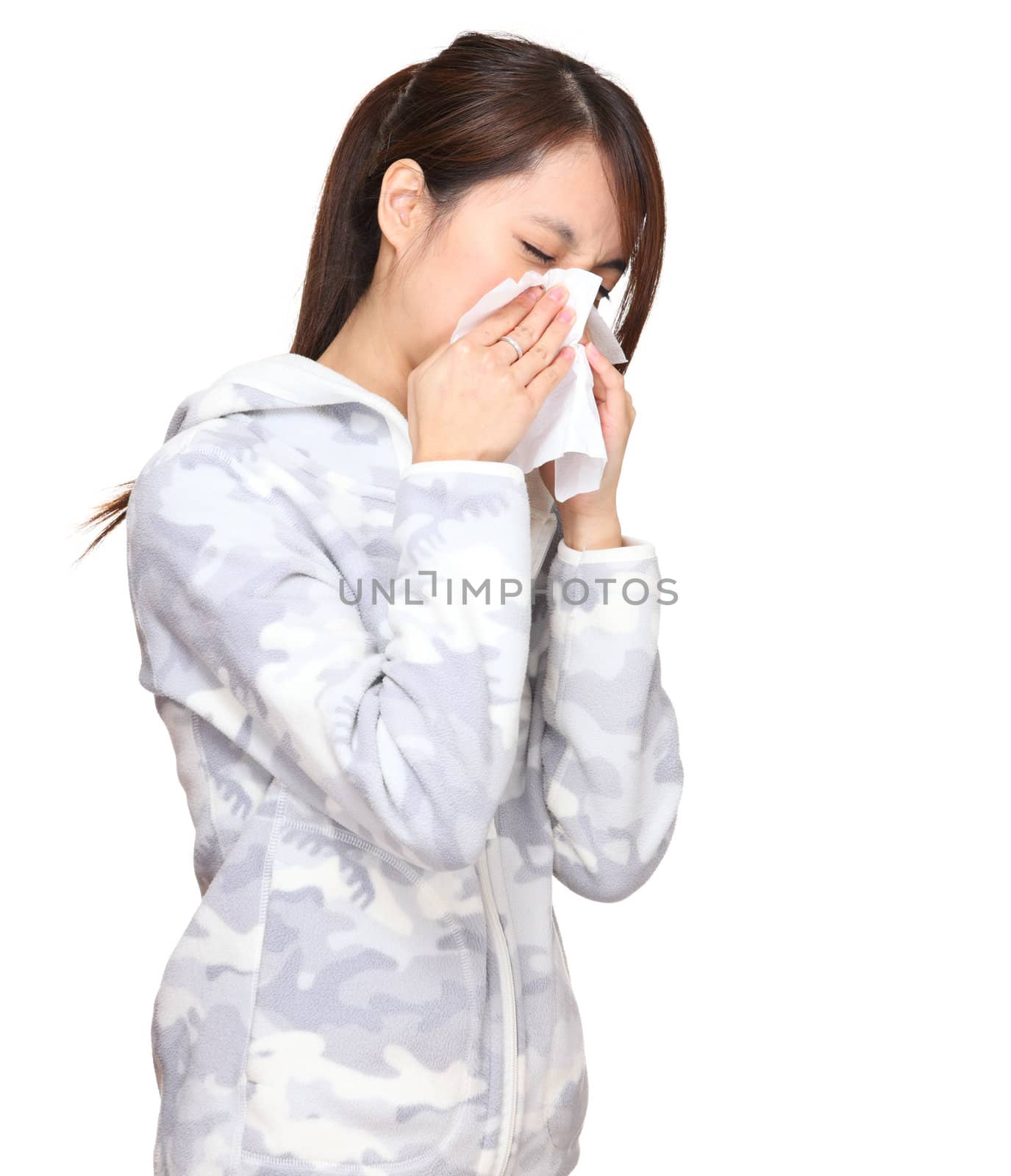 sneezing asian young woman