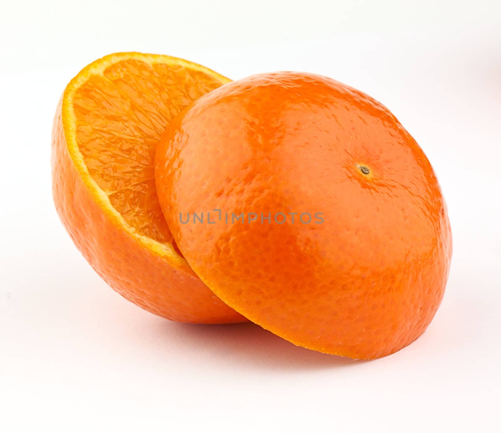 Sliced mandarin fruit isolated on white background