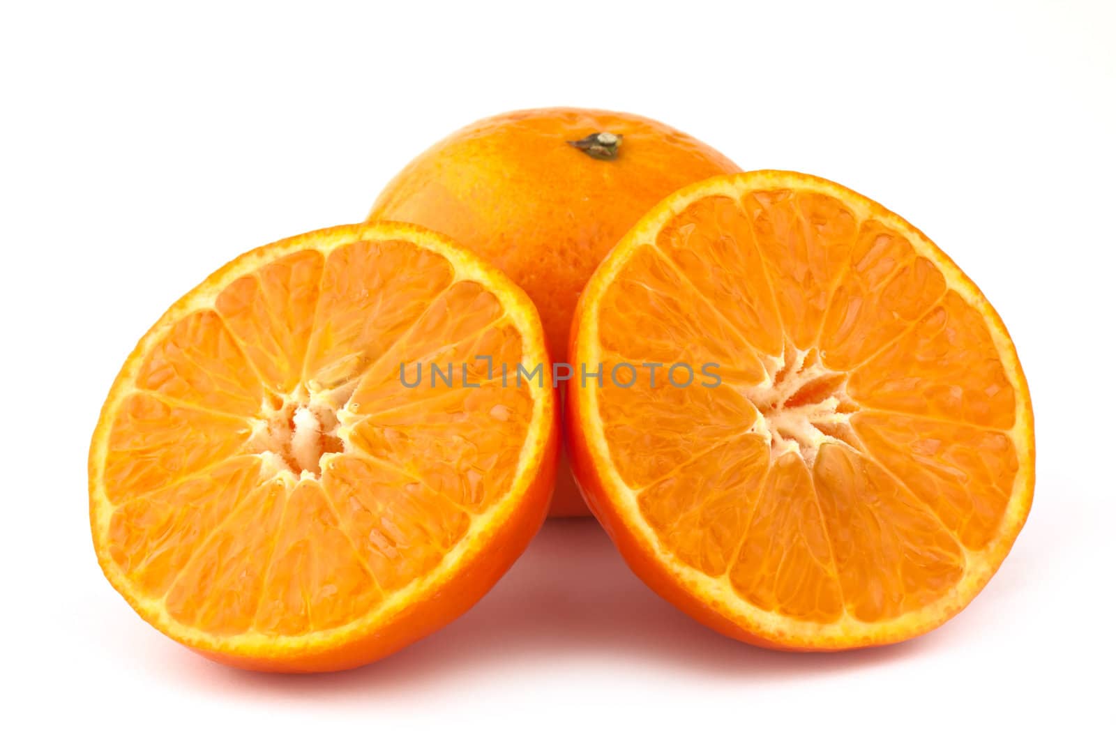 Sliced mandarin fruit isolated on white background