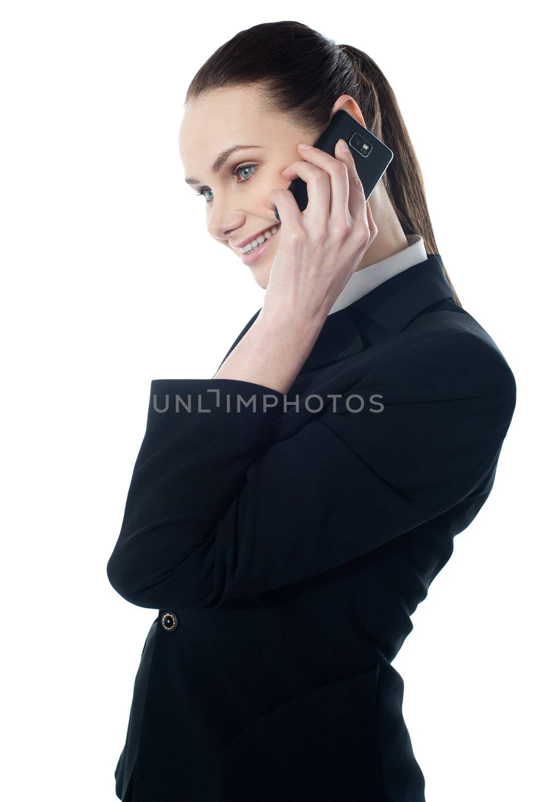 Pretty businesswoman communicating isolated over white