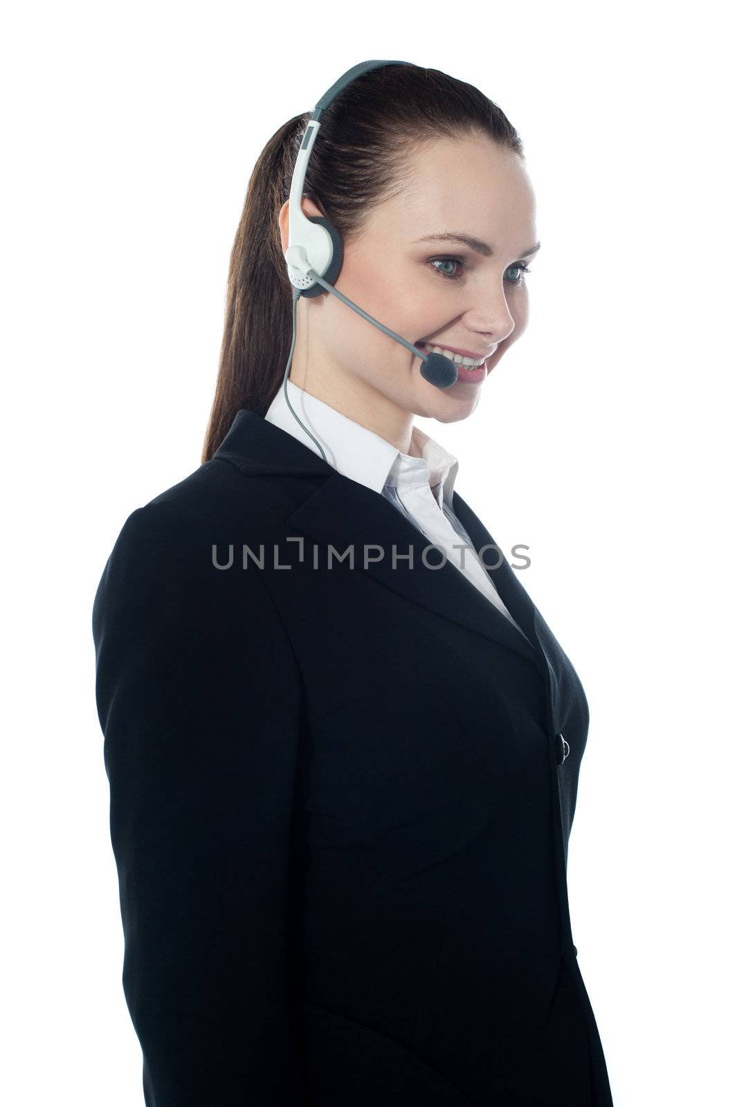 Beautiful help-desk female executive by stockyimages