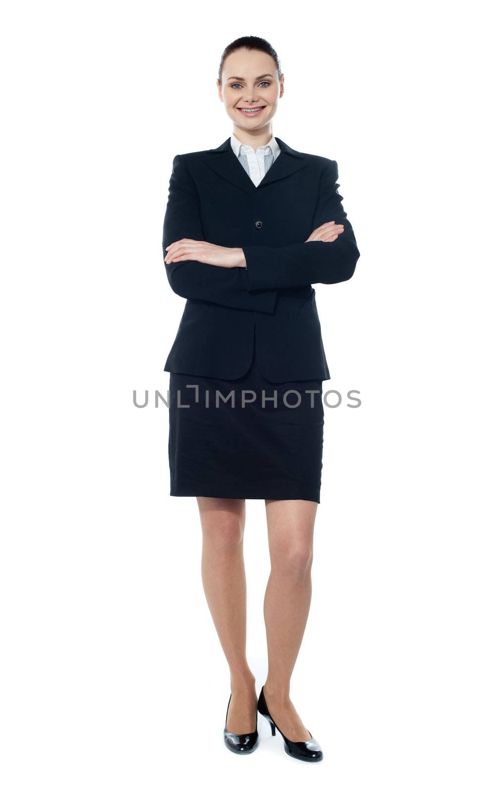 Businesswoman posing with folded arms isolated over white, full-length