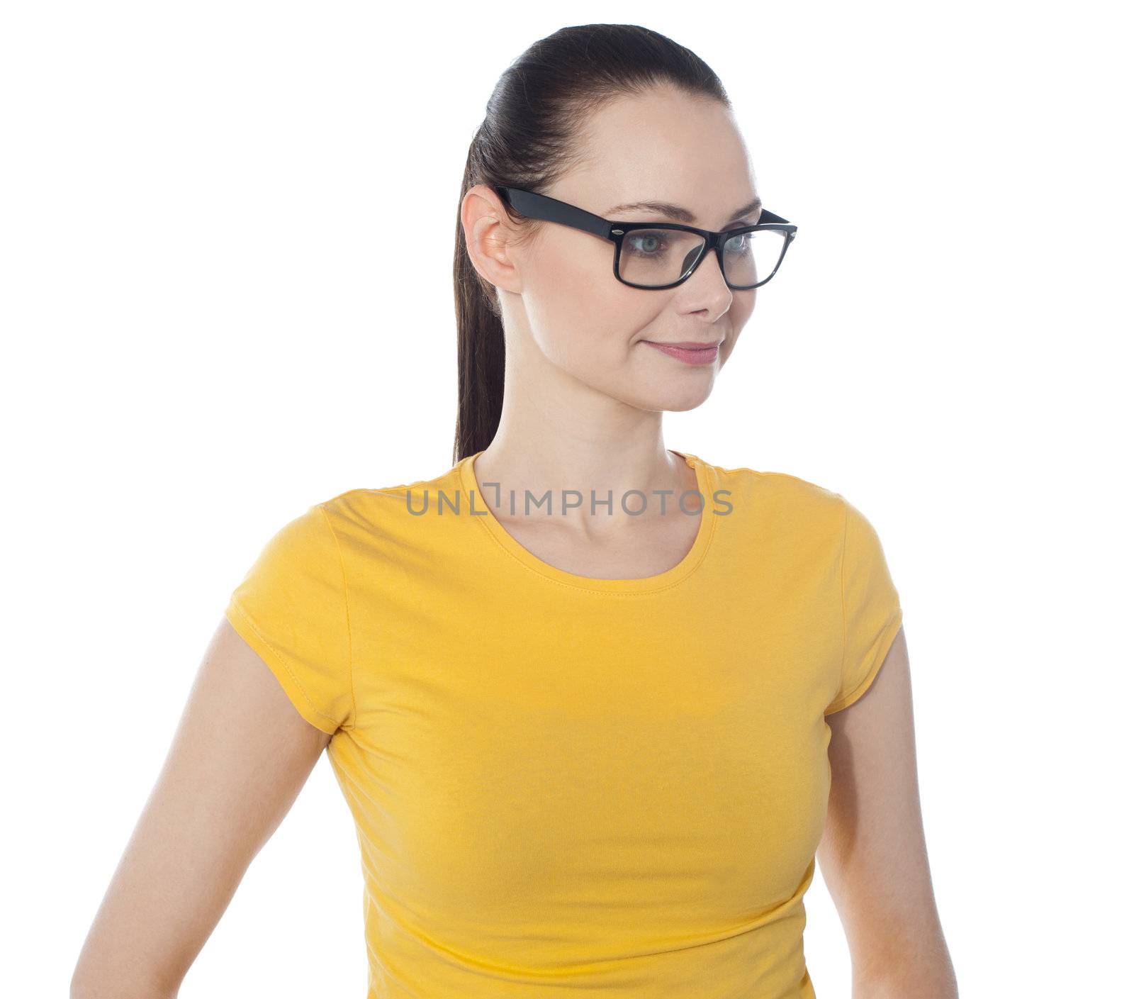 Portrait of teenager in spectacles against white background