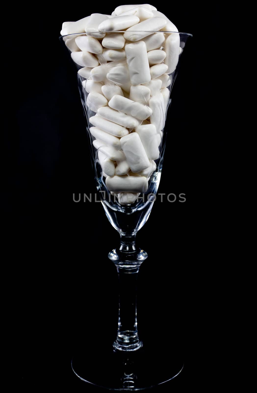 Picture of a bunch of white gums in a wine glass