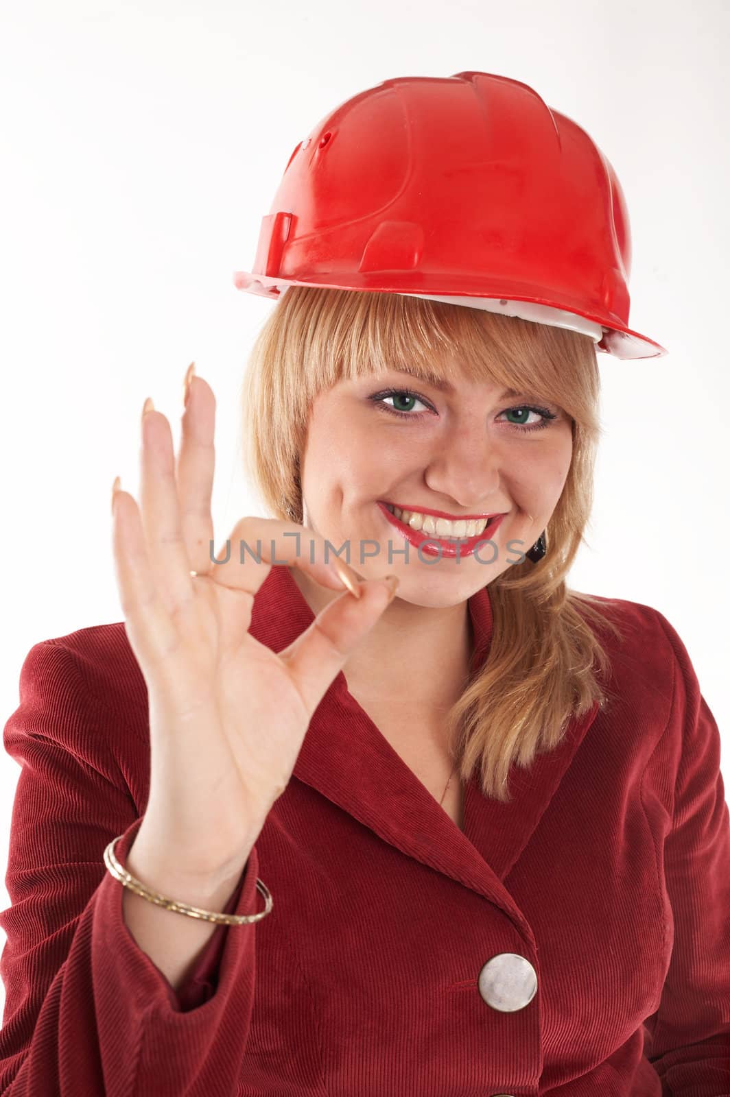 An image of girl showing sign OK