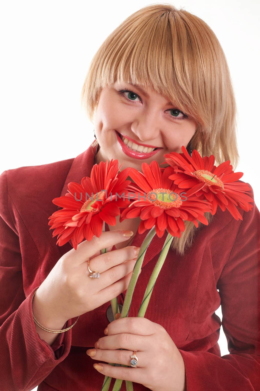 A green-eyed woman in red with red flowers