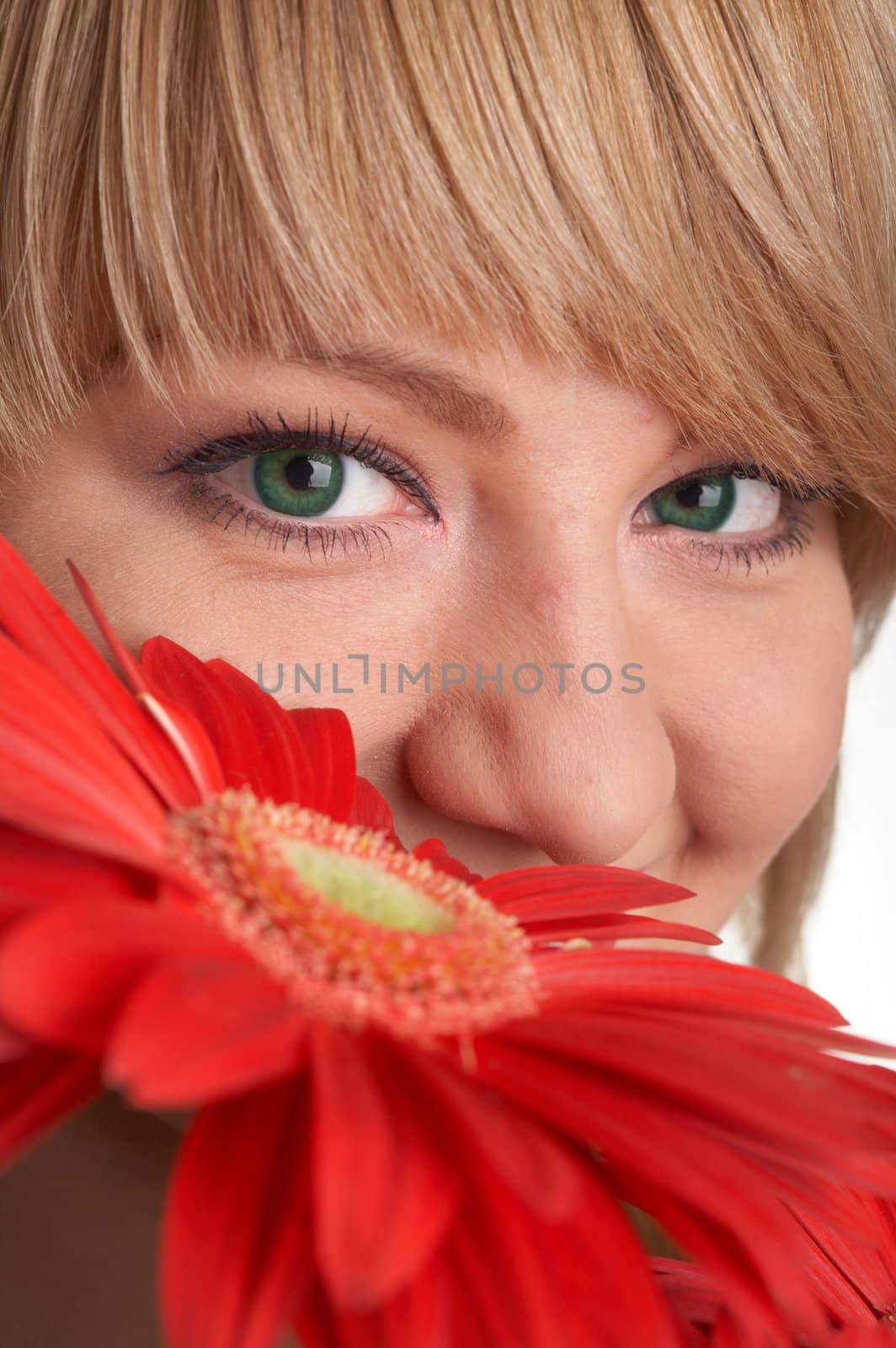 An image of nice girl with red flowers