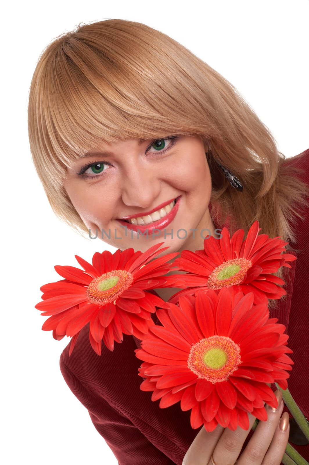 A young girl with three flowers