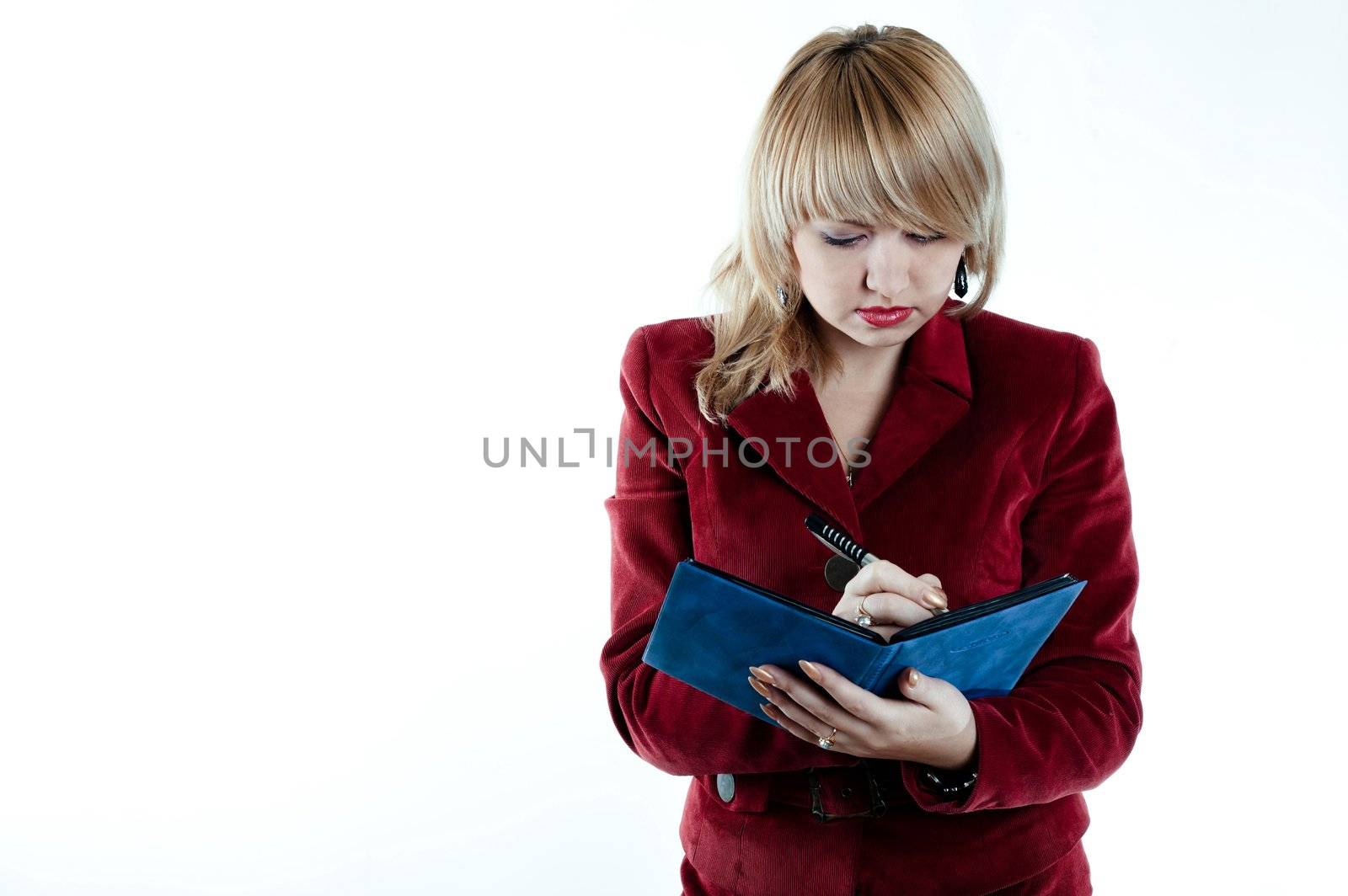 An image of a businesswoman with notebook