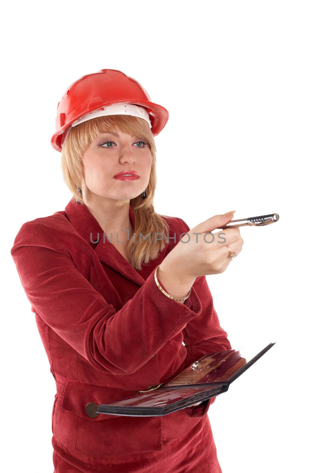 An image of lady writing something in her notebook