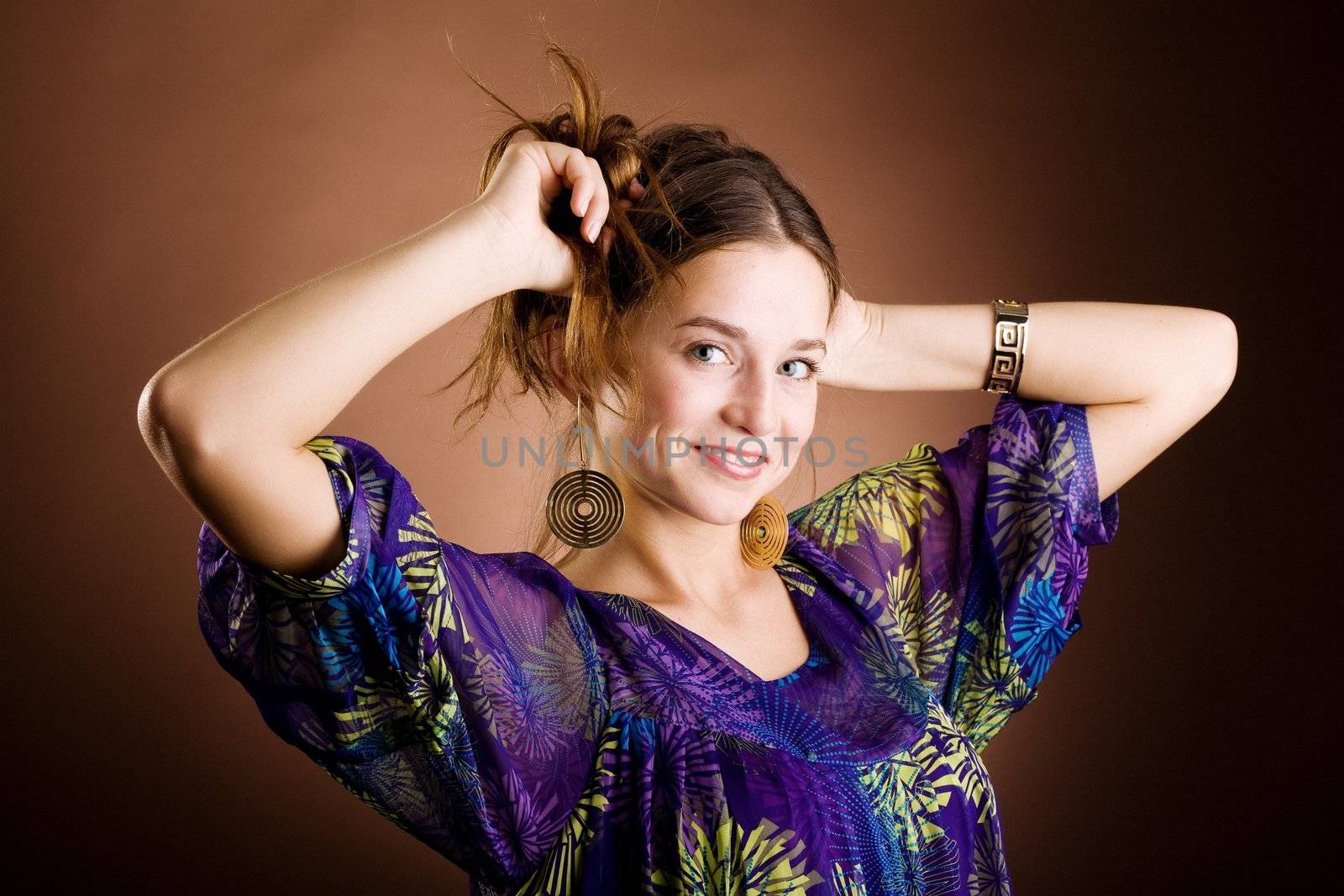 An image of a beautiful girl in violet dress