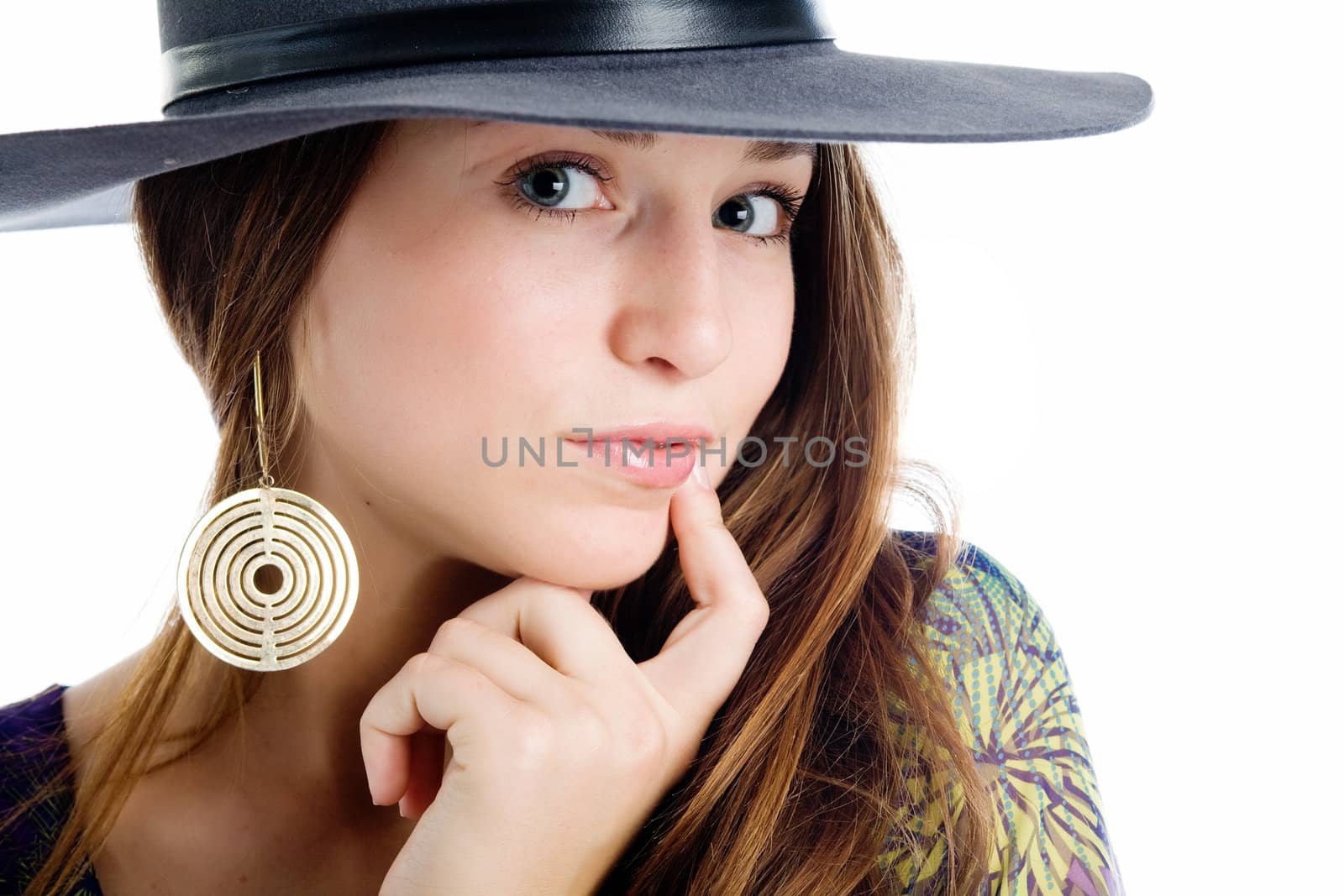 An image of a young girl in a grey hat