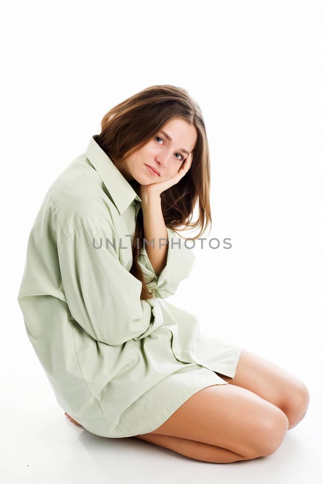 An image of a nice girl sitting on the floor