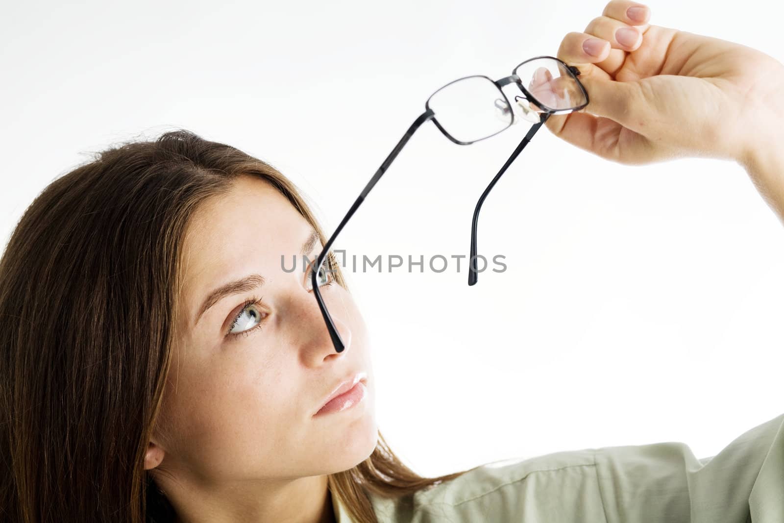 An image of a beautiful young girl with glasses