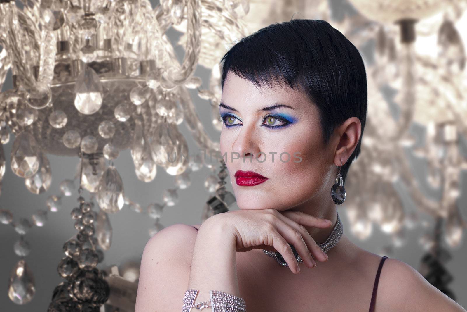 glamorous stylish short haired woman with jewellery