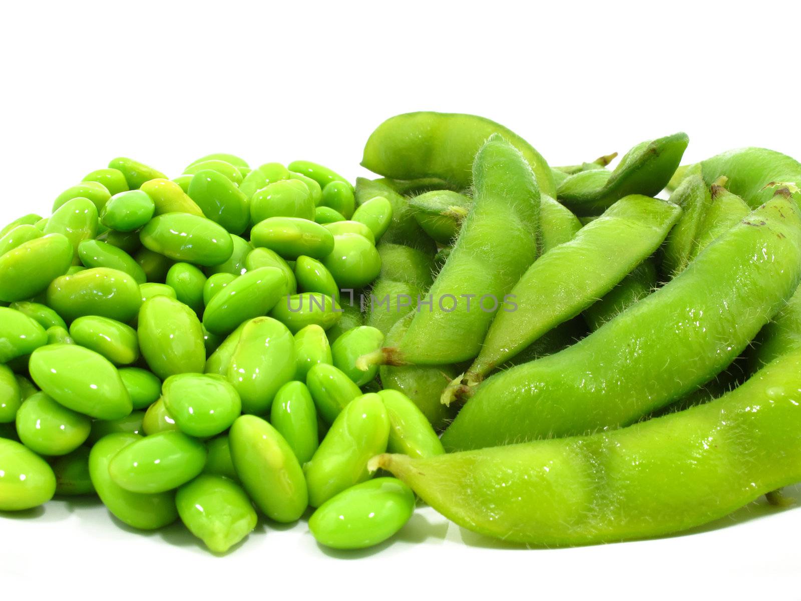 Edamame soy beans shelled and pods by iampuay