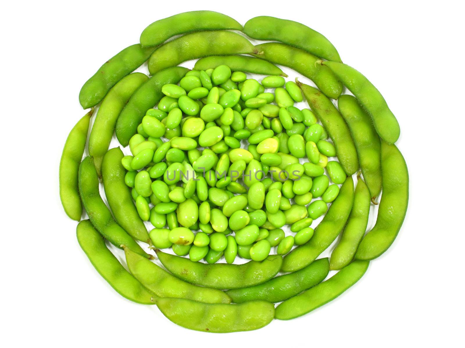 Edamame soy beans shelled and pods on white background