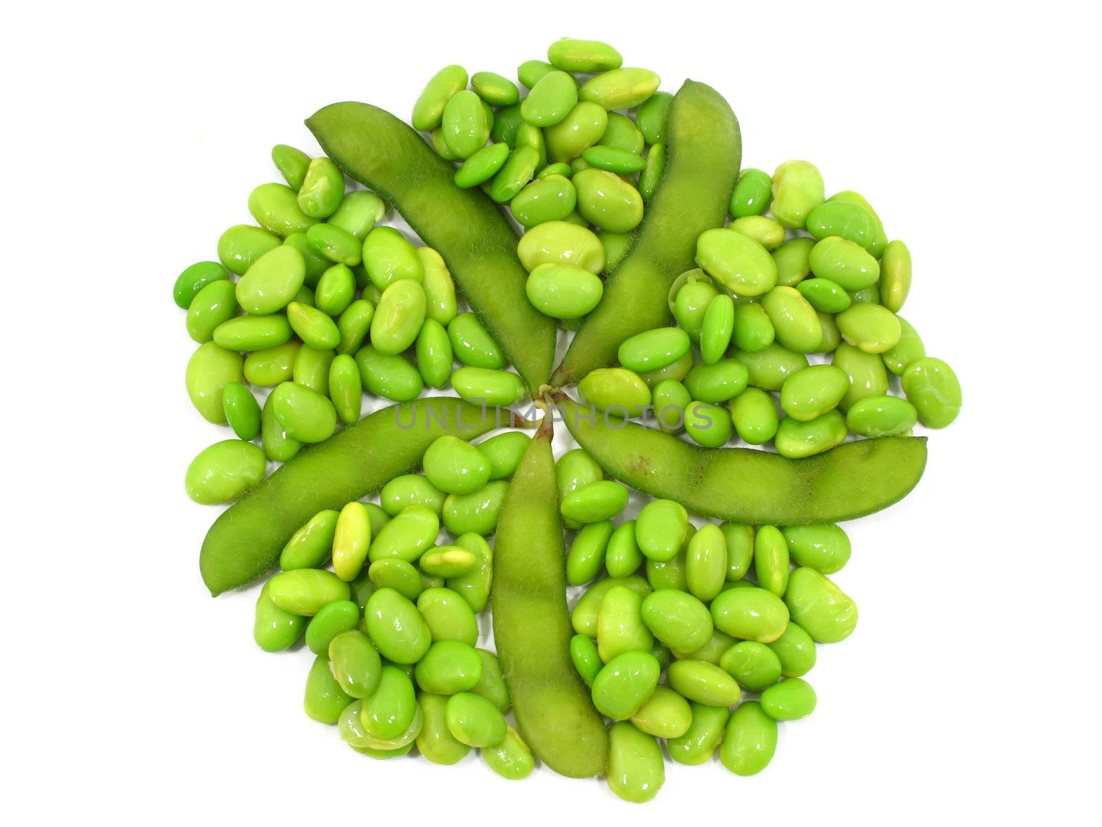 Edamame soy beans shelled and pods on white background