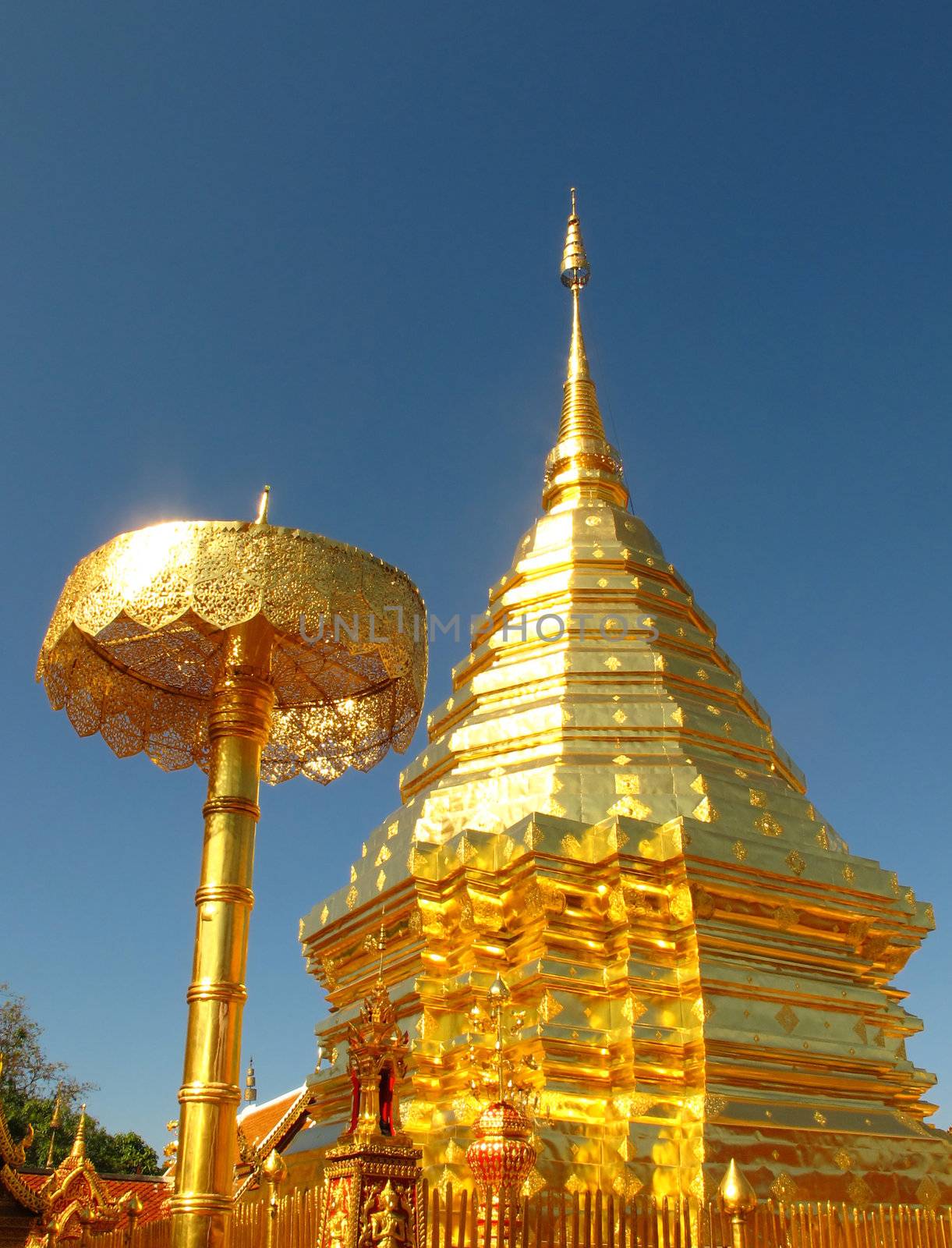 Golden pagoda with blue sky at Doi Suthep