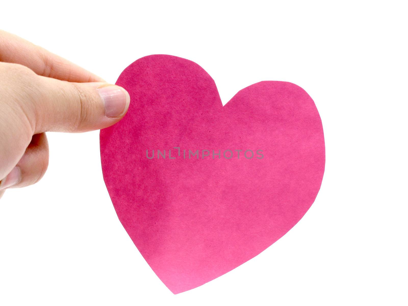 A hand hold a pink heart on white background