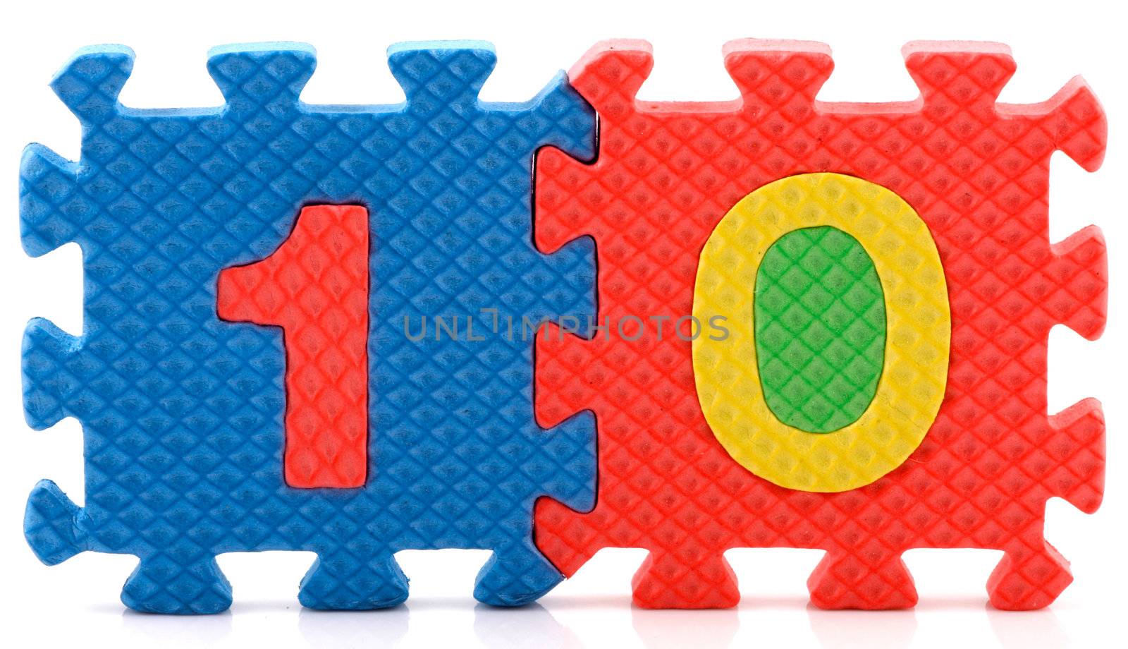 Alphabet puzzle pieces on white background