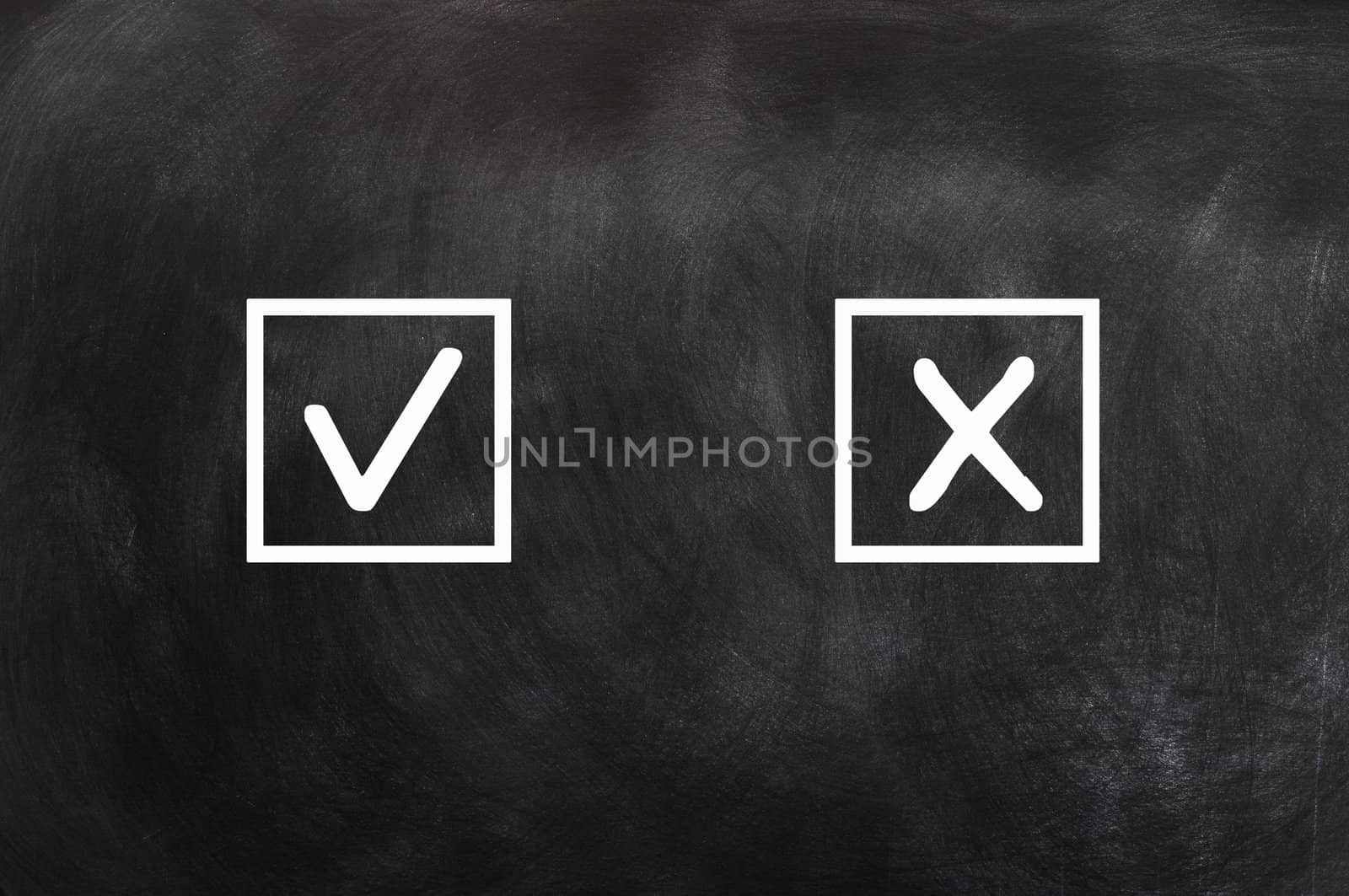 Check boxes with tick and cross on a blackboard